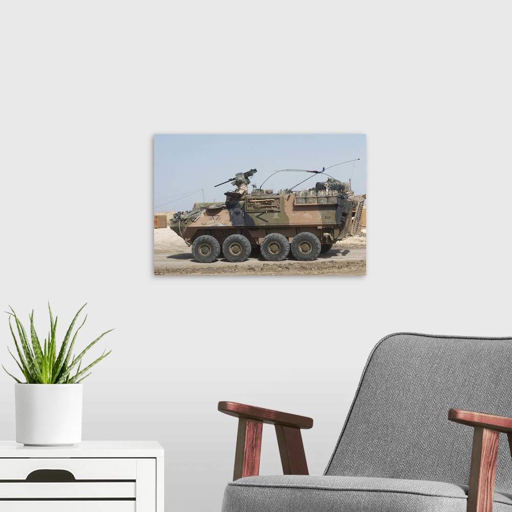 A modern room featuring A LAV III infantry fighting vehicle in Afghanistan.