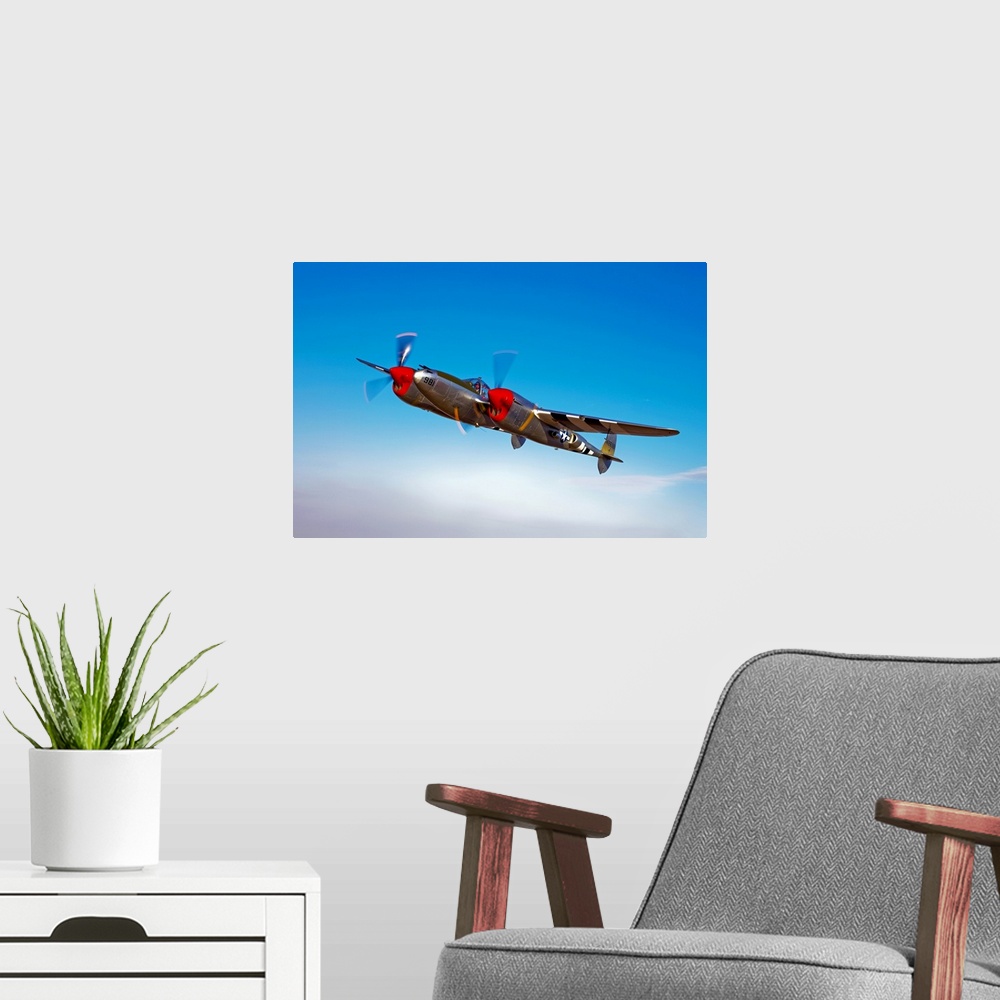 A modern room featuring A Lockheed P-38 Lightning fighter aircraft in flight near Chino, California.
