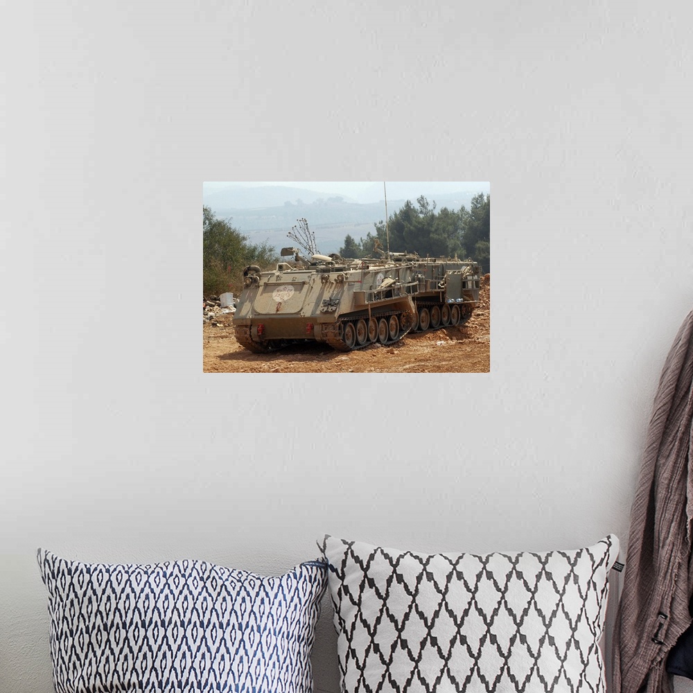 A bohemian room featuring A M113 armored personnel carrier of the Israel Defense Forces.