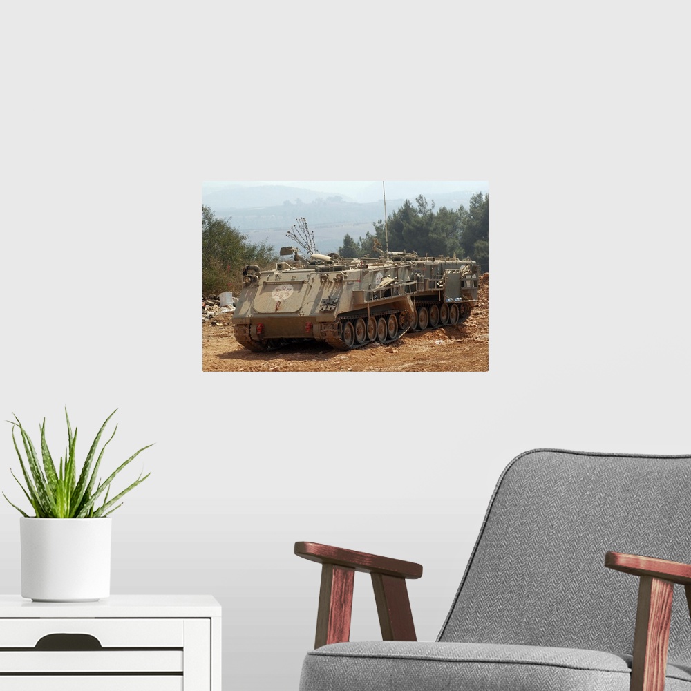 A modern room featuring A M113 armored personnel carrier of the Israel Defense Forces.