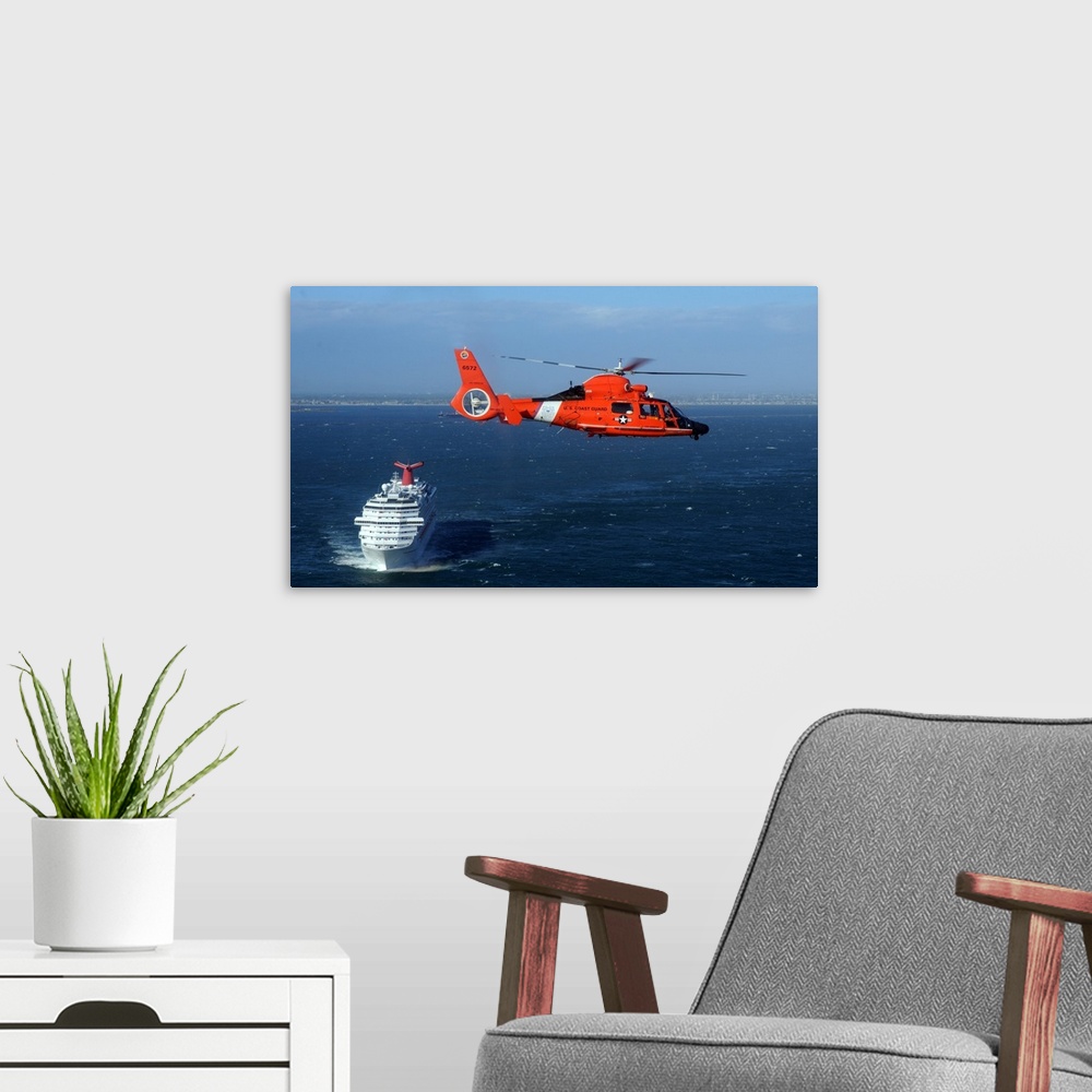 A modern room featuring A MH-65C Dolphin helicopter off the coast of San Pedro, California.
