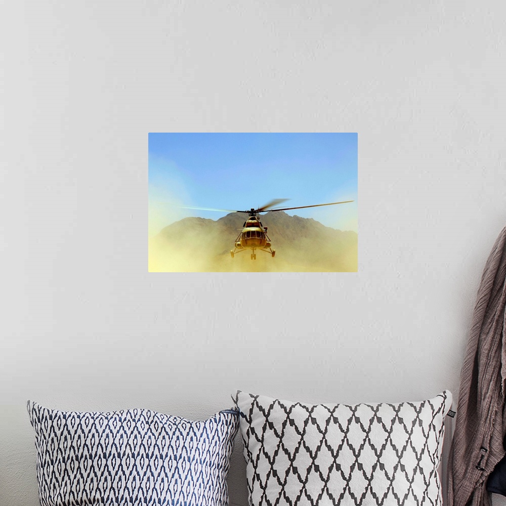 A bohemian room featuring A Mi17 Hip helicopter hovers over a firing range in Afghanistan