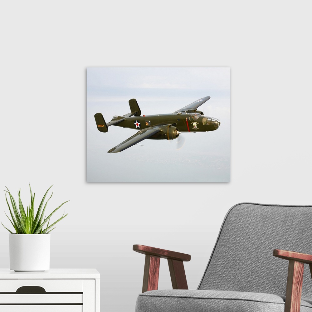 A modern room featuring A North American B-25 Mitchell in flight over Galveston, Texas.