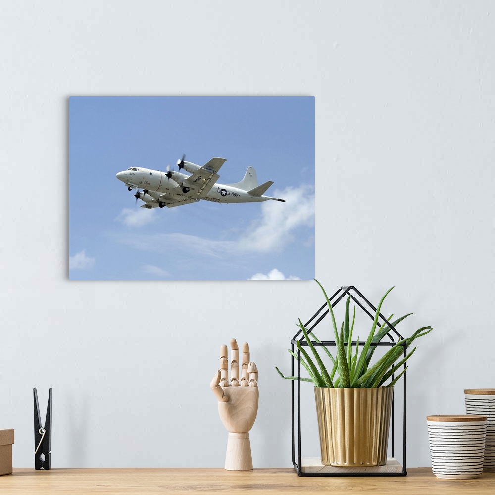 A bohemian room featuring Kaneohe, Hawaii, July 14, 2012 - A P-3C Orion aircraft takes off from Marine Corps Base Hawaii to...