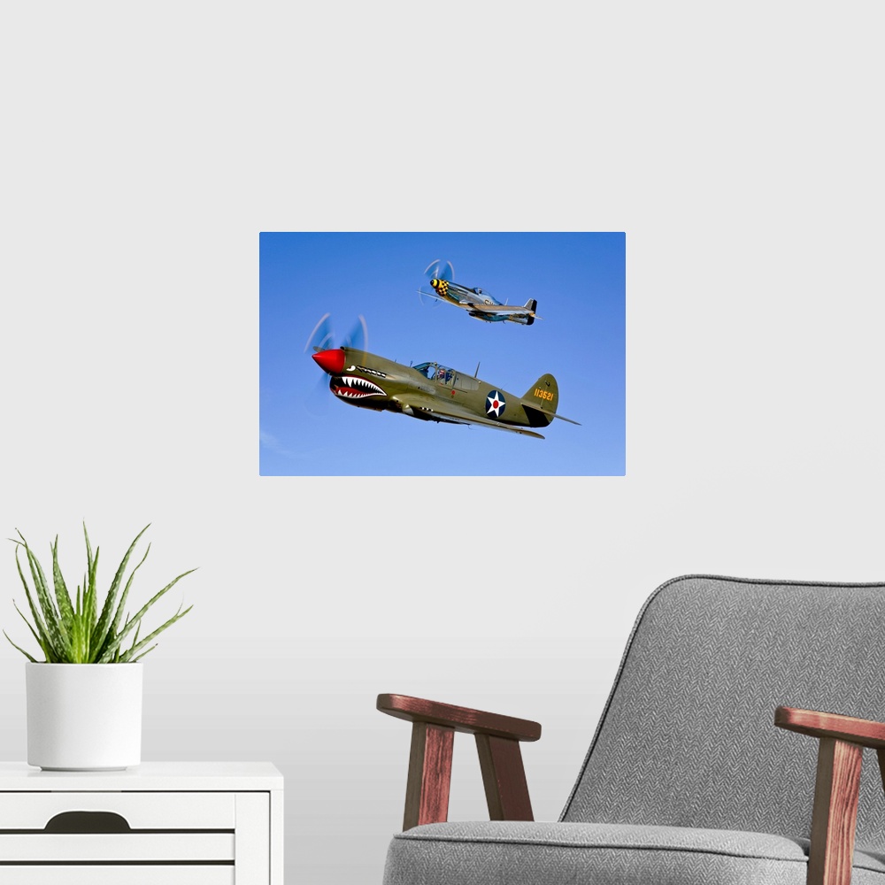 A modern room featuring Photograph taken of classic military aircrafts as they fly in sync across a clear blue sky.