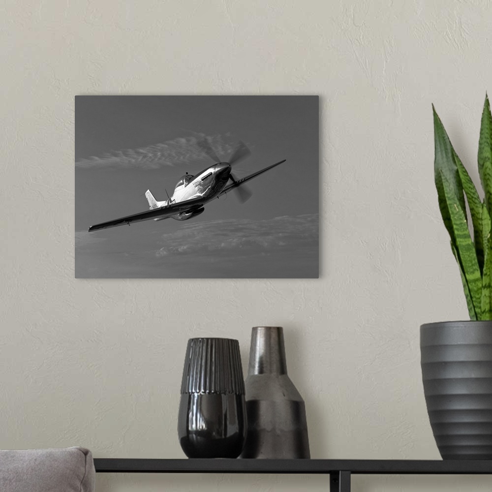 A modern room featuring A P-51D Mustang in flight near Chino, California.