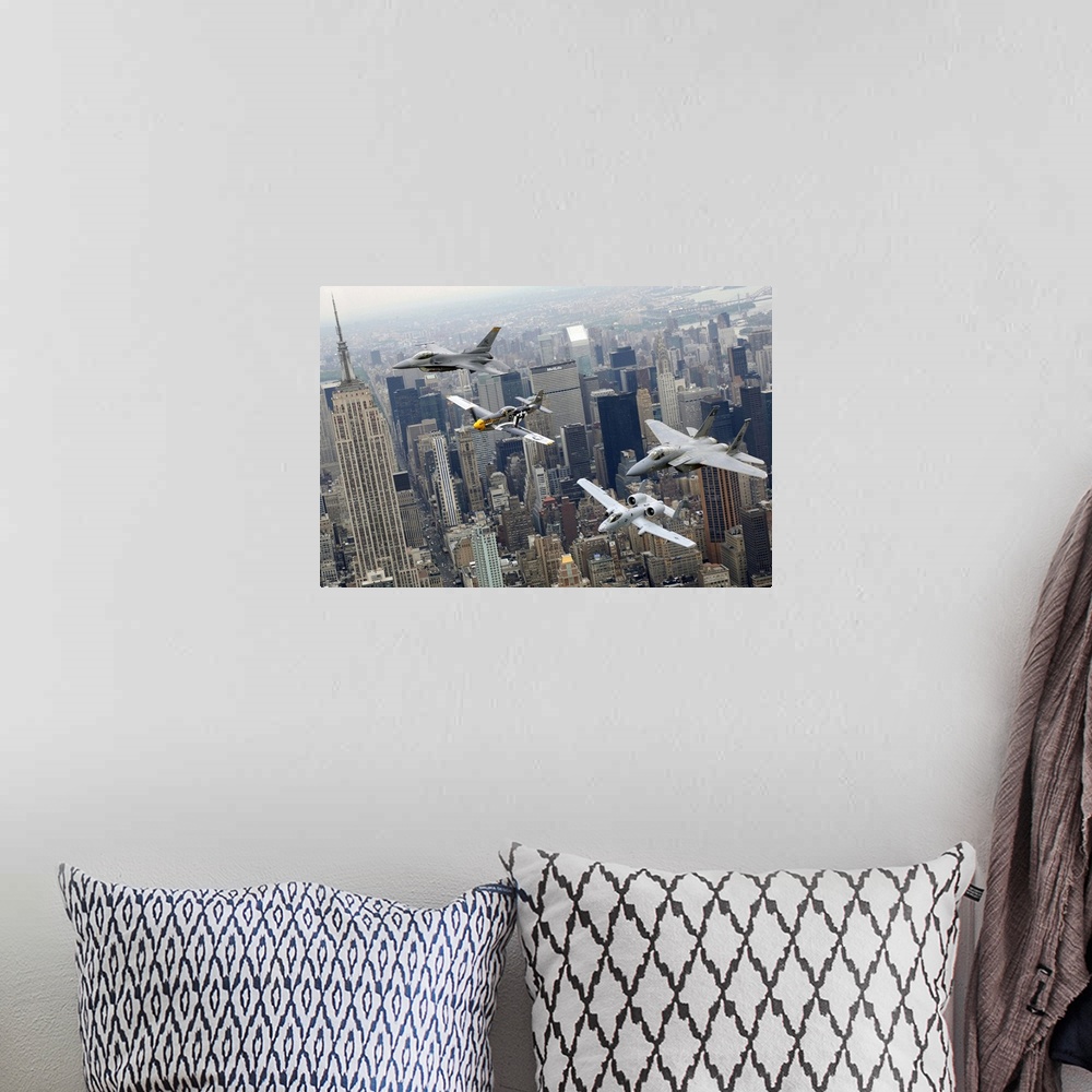 A bohemian room featuring Photograph of military jets flying over city buildings on a foggy day.