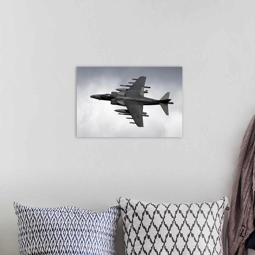 A bohemian room featuring A Royal Air Force Harrier GR9 flying low over North Wales. The Harrier GR9 is a single seat, mult...