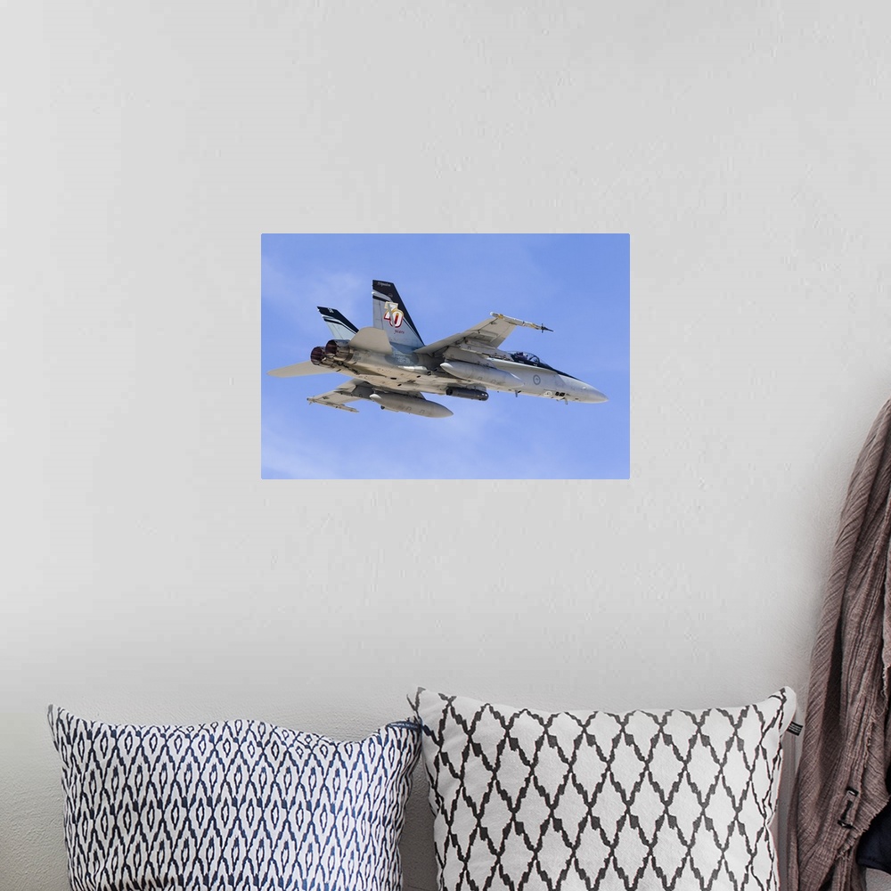 A bohemian room featuring A Royal Australian Air Force F/A-18A Hornet taking off.