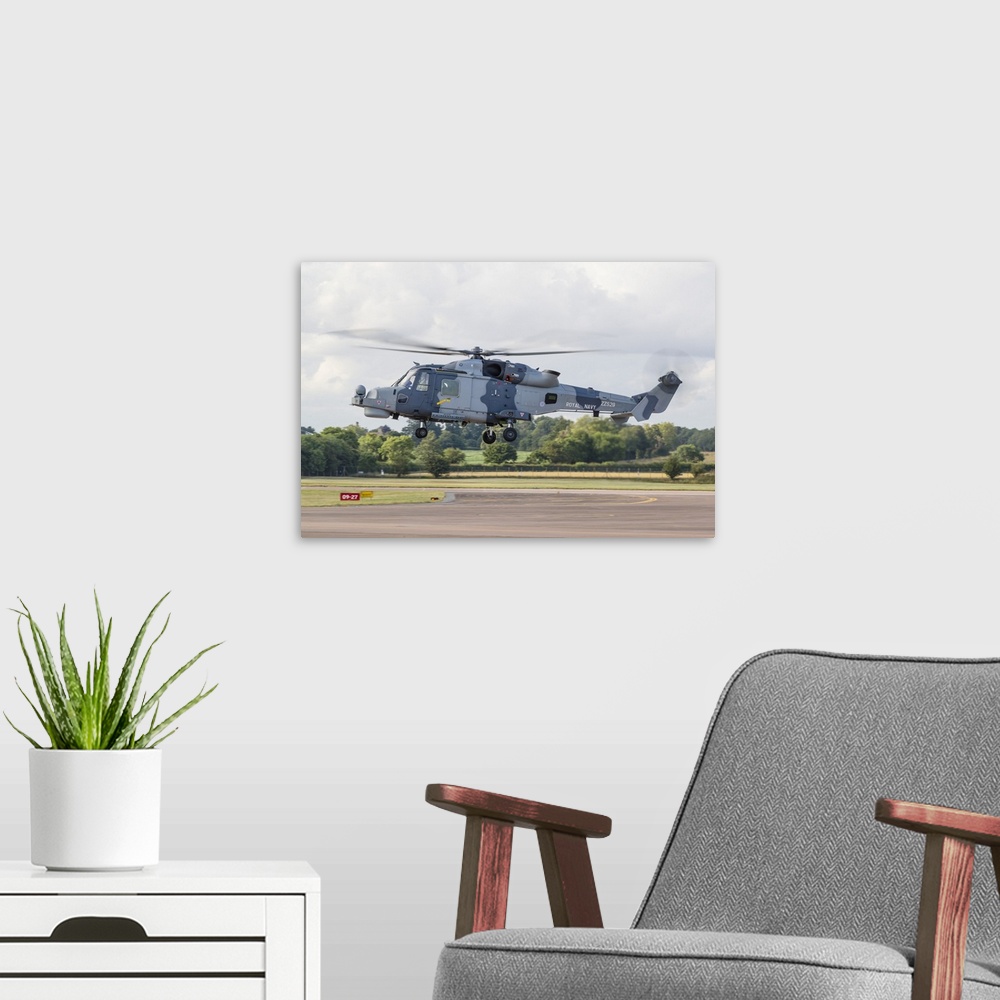 A modern room featuring A Royal Navy Wildcat helicopter landing at RAF Fairford in the United Kingdom.