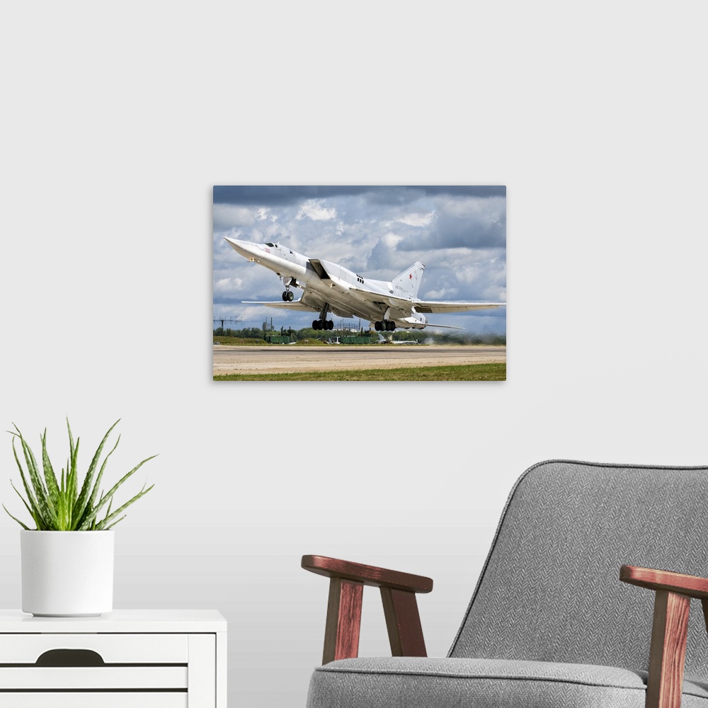 A modern room featuring A Russian Aerospace Forces Tu-22M-3 long-range bomber plane.