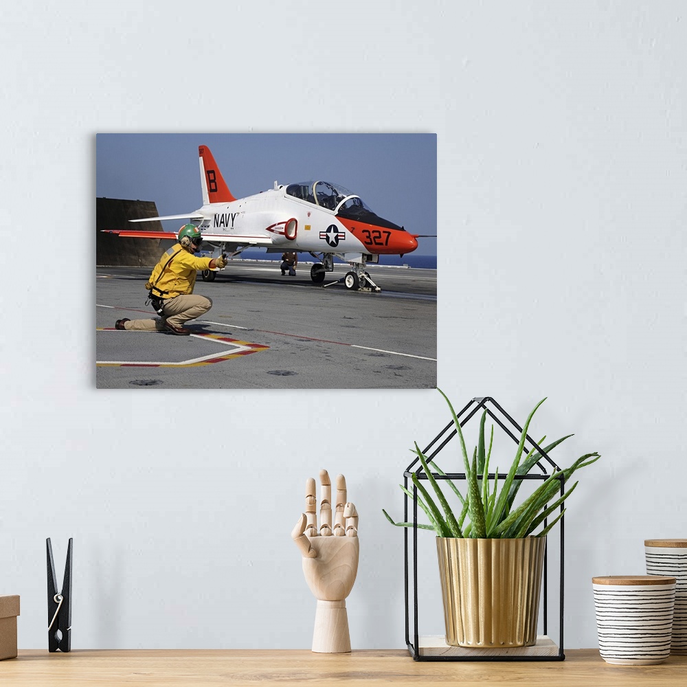 A bohemian room featuring Atlantic Ocean, June 13, 2010 - A shooter launches a T-45A Goshawk assigned to Training Wing 2 fr...