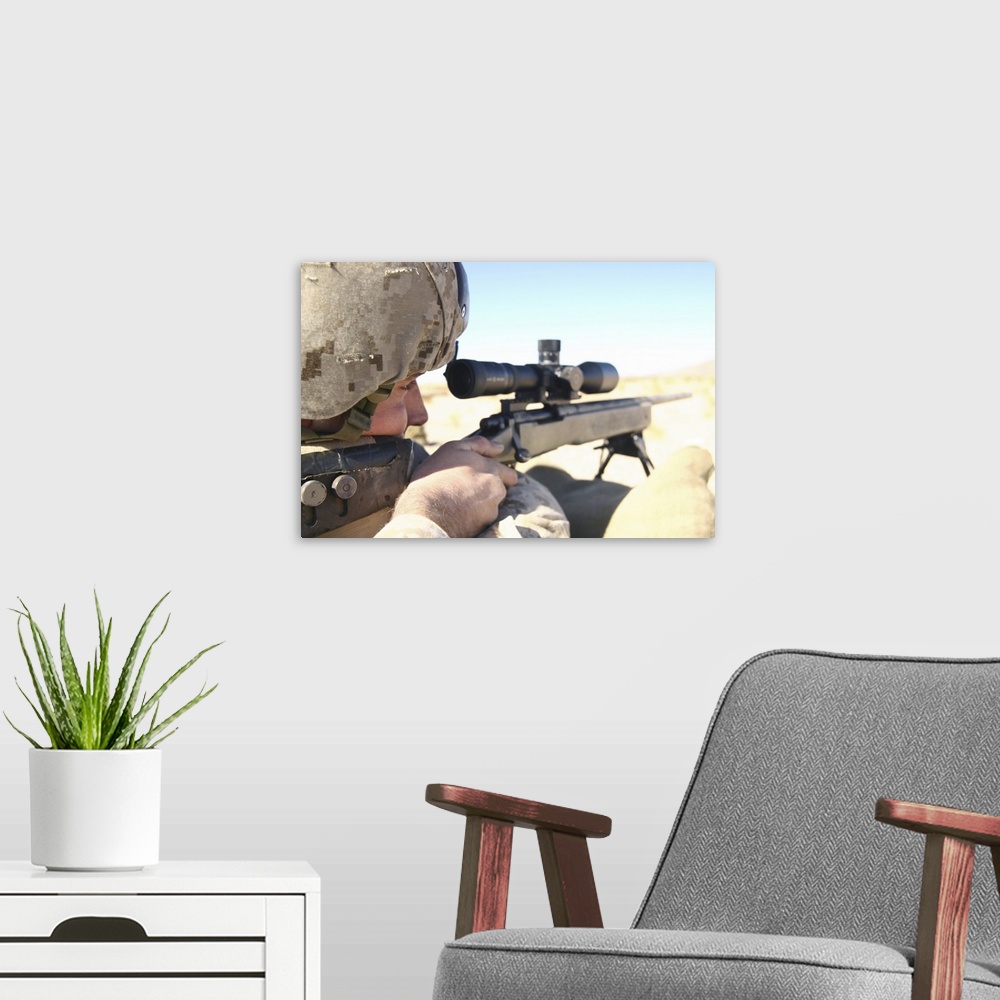 A modern room featuring A soldier aims in with his M40A3 Scout Sniper Rifle