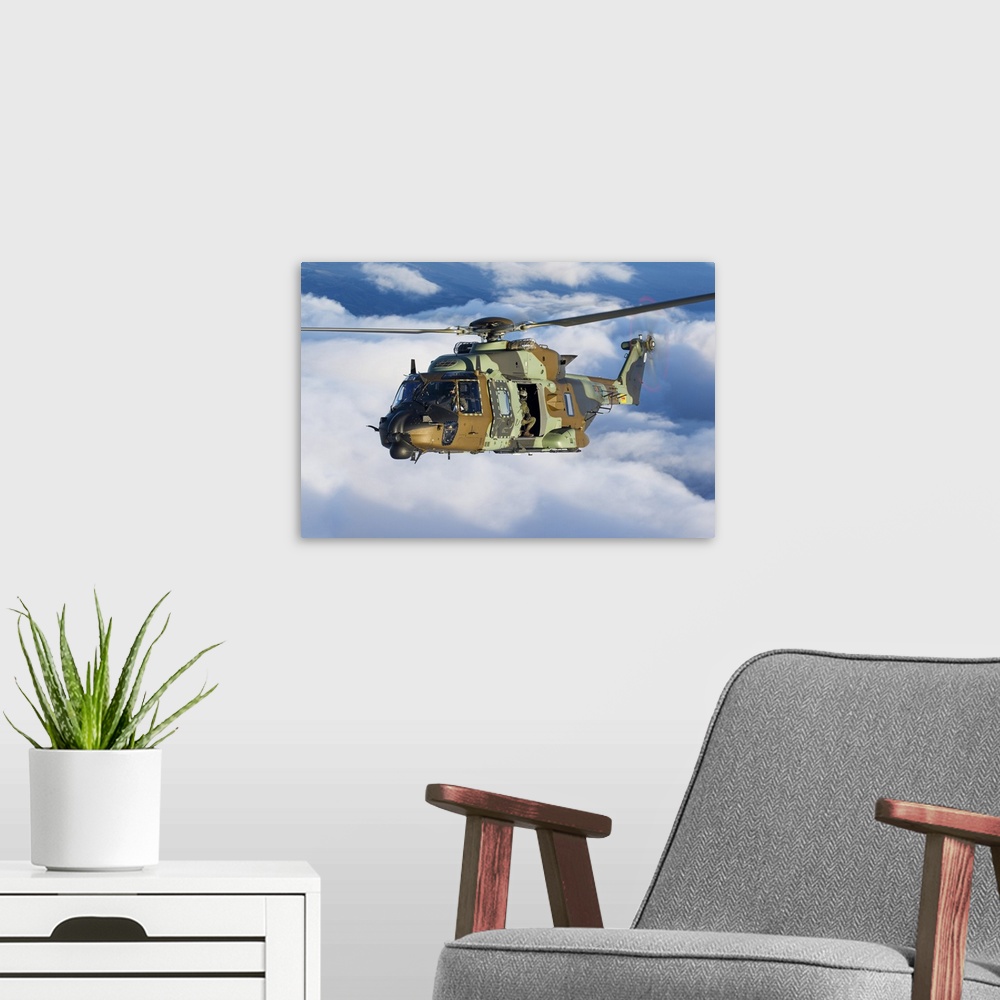 A modern room featuring A Spanish Army NH90 transport helicopter during a training flight from its homebase in Logrono, S...