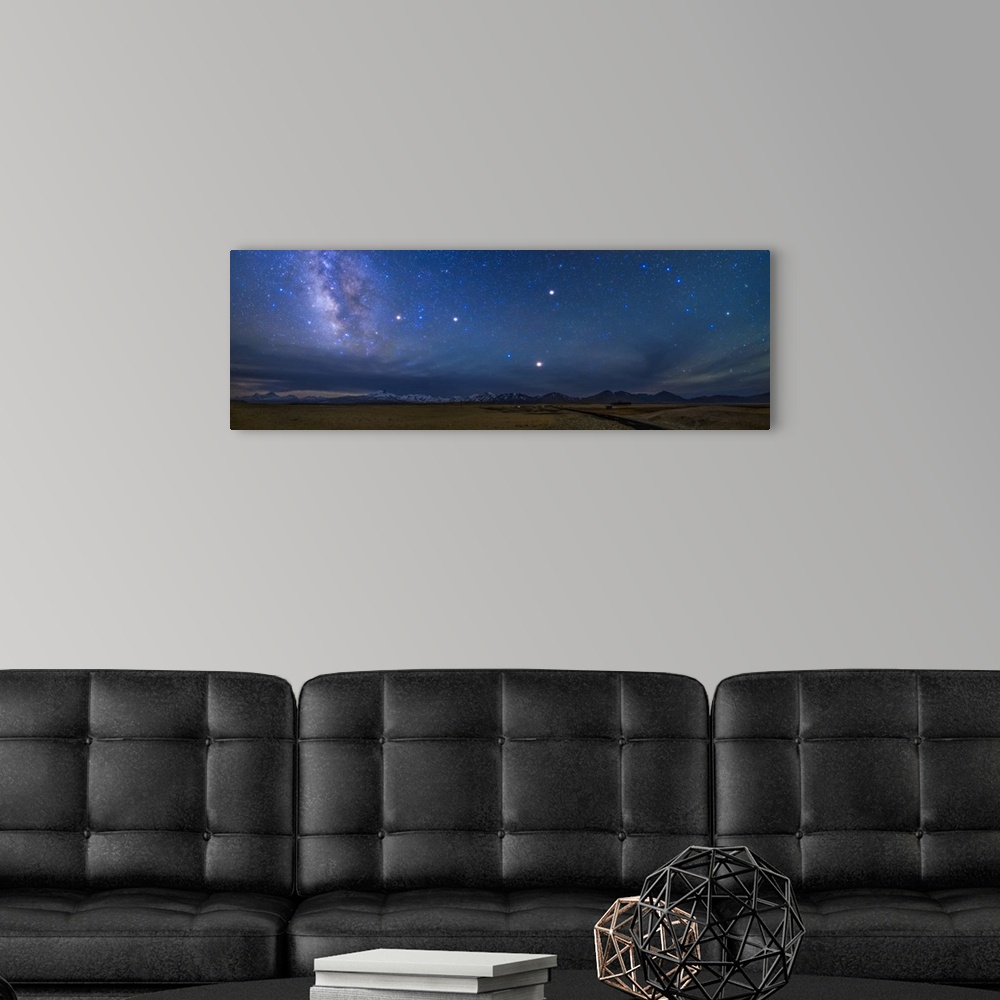 A modern room featuring A starry sky over the Himalayas in Tibet, China. On the left (south) the bright central bulge of ...