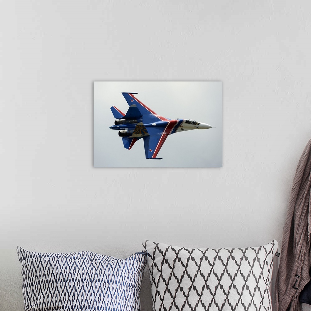 A bohemian room featuring A Sukhoi Su-27 Flanker of the Russian Knights aerobatic team.