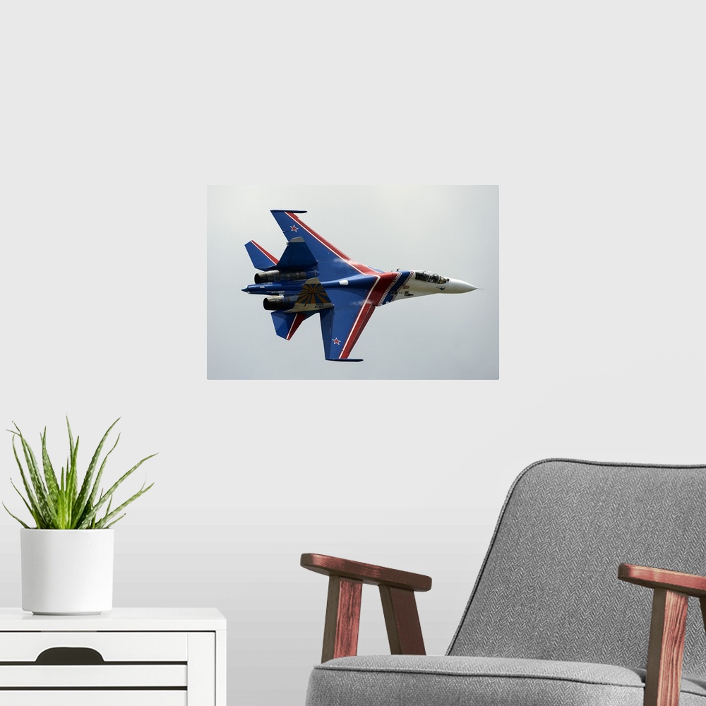 A modern room featuring A Sukhoi Su-27 Flanker of the Russian Knights aerobatic team.