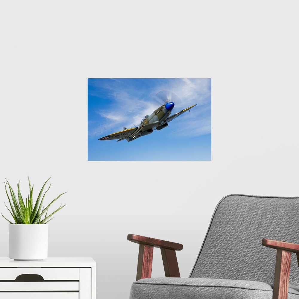A modern room featuring A Supermarine Spitfire Mk-18 in flight near West Chester County, Pennsylvania.