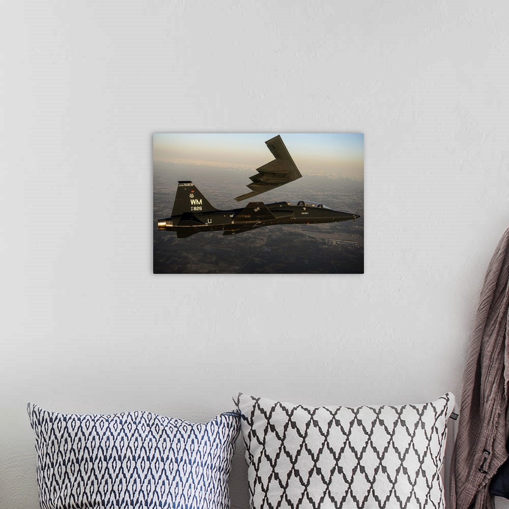 A bohemian room featuring February 20, 2014 - A T-38 Talon flies in formation with the B-2 Spirit of South Carolina during ...
