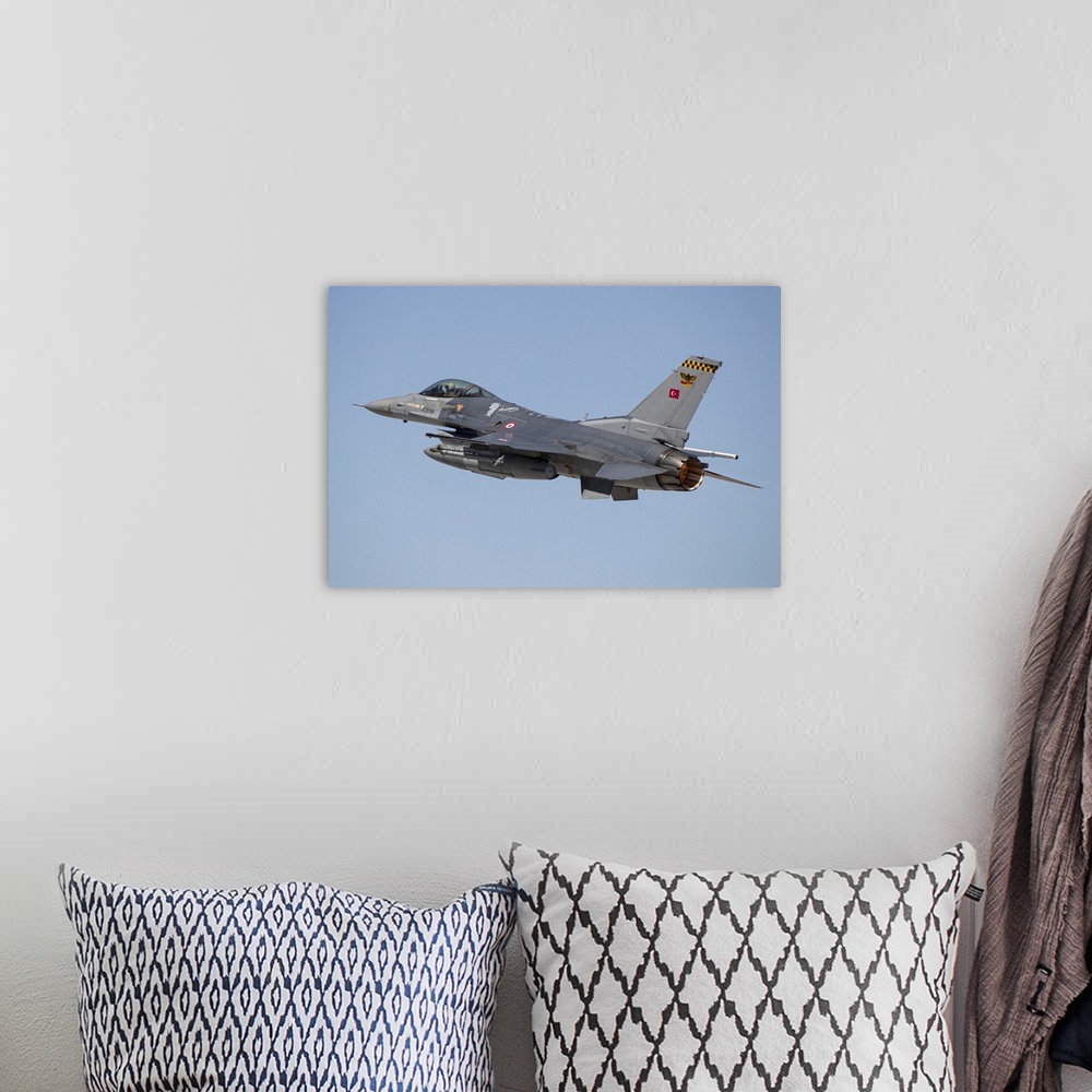 A bohemian room featuring A Turkish Air Force F-16 Fighting Falcon taking off in full afterburner. The Turkish Air Force ha...