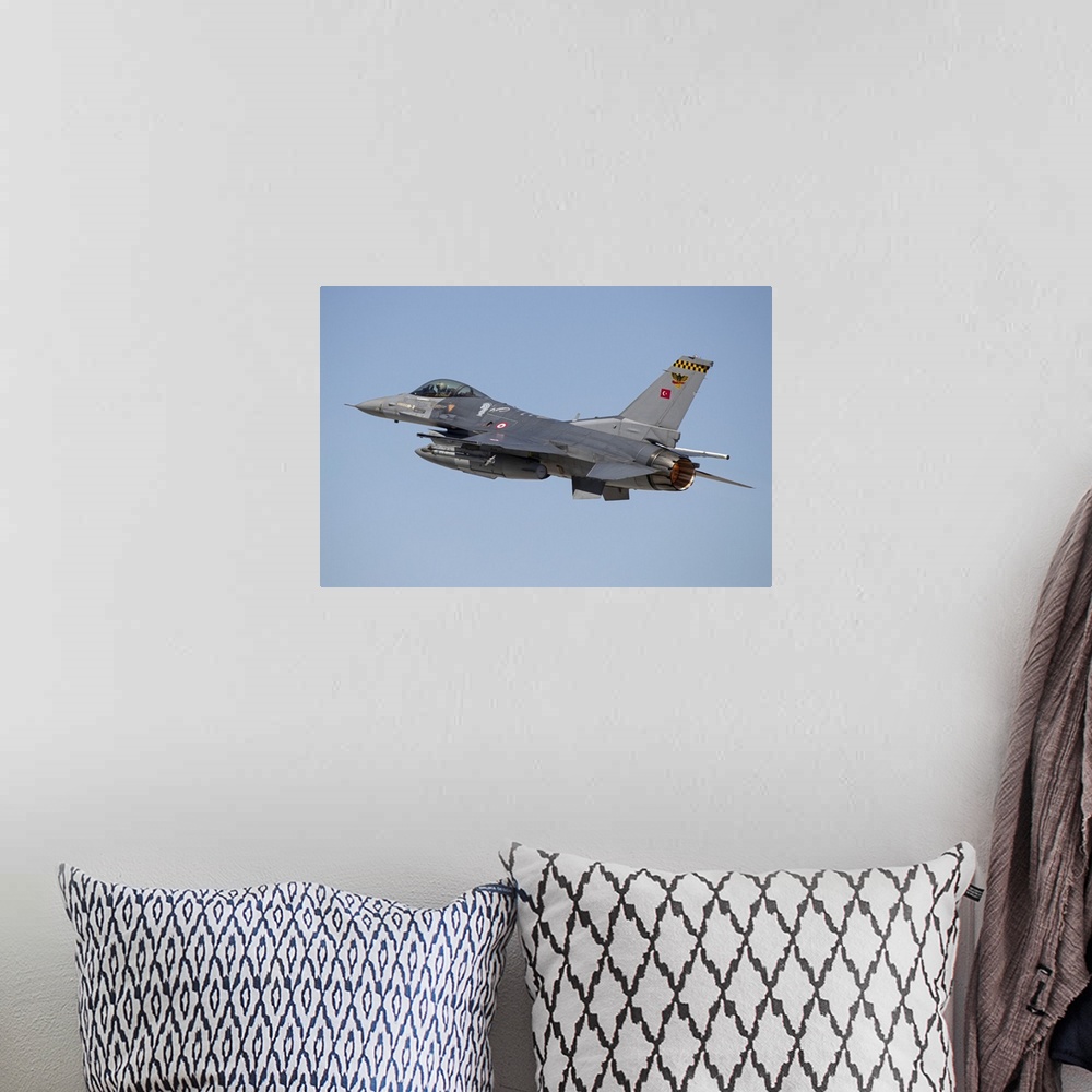 A bohemian room featuring A Turkish Air Force F-16 Fighting Falcon taking off in full afterburner. The Turkish Air Force ha...