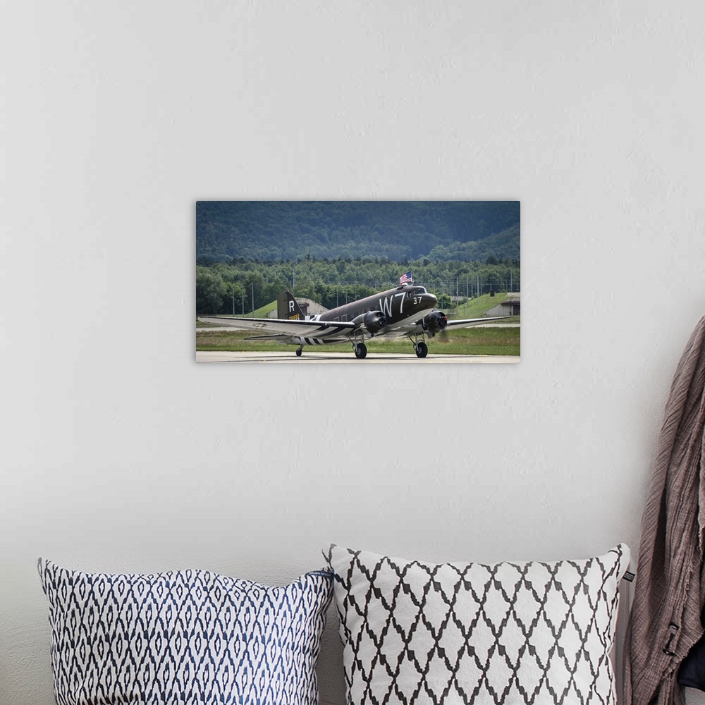A bohemian room featuring May 26, 2014 - A U.S. Air Force C-47 Skytrain aircraft lands at Ramstein Air Base, Germany, befor...