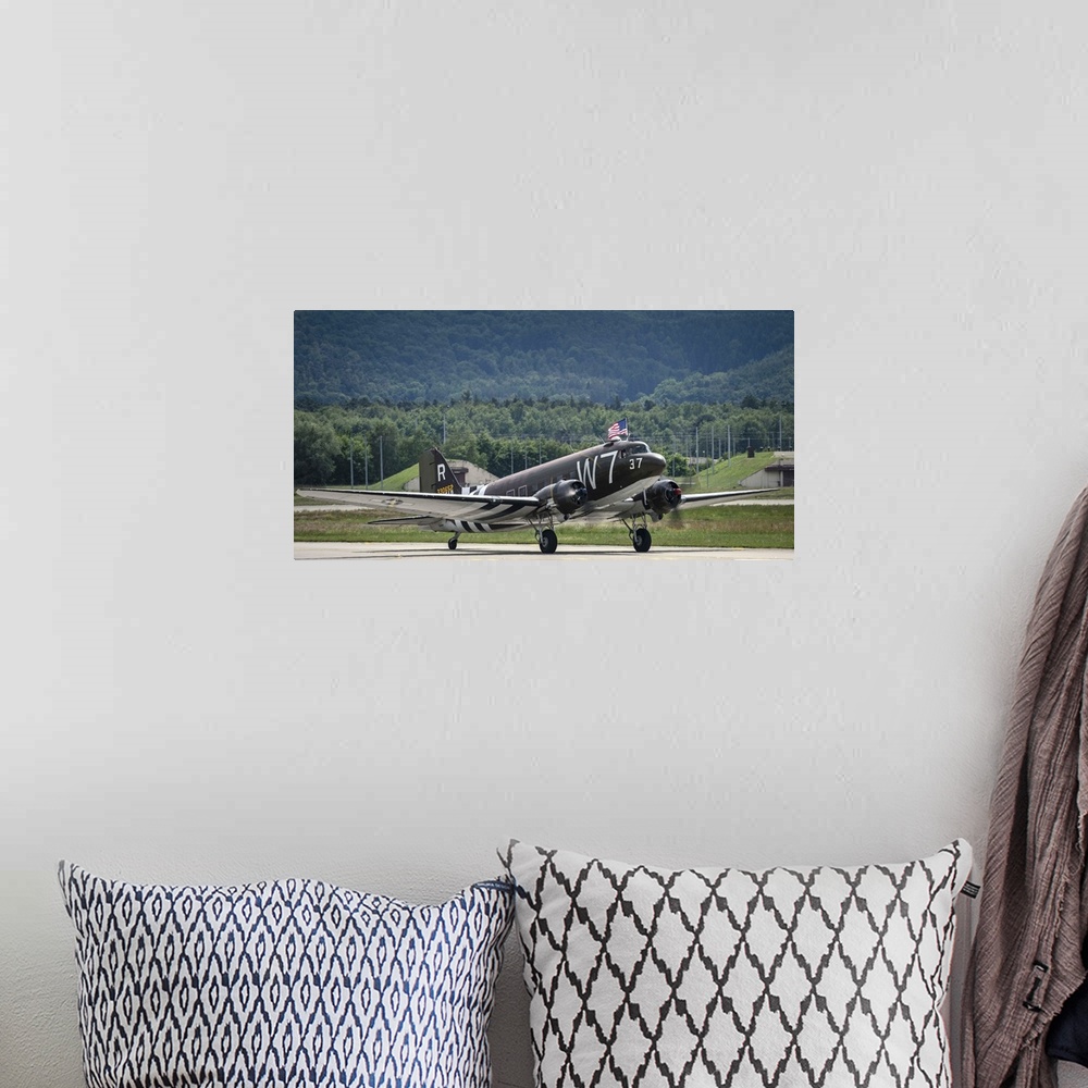 A bohemian room featuring May 26, 2014 - A U.S. Air Force C-47 Skytrain aircraft lands at Ramstein Air Base, Germany, befor...