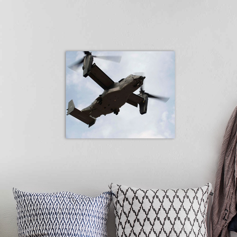 A bohemian room featuring February 1, 2011 - A U.S. Air Force CV-22 Osprey tiltrotor aircraft takes off during a local trai...