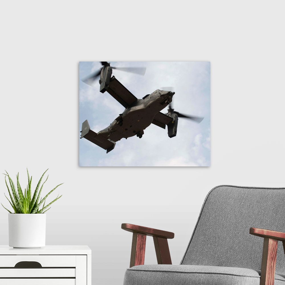 A modern room featuring February 1, 2011 - A U.S. Air Force CV-22 Osprey tiltrotor aircraft takes off during a local trai...