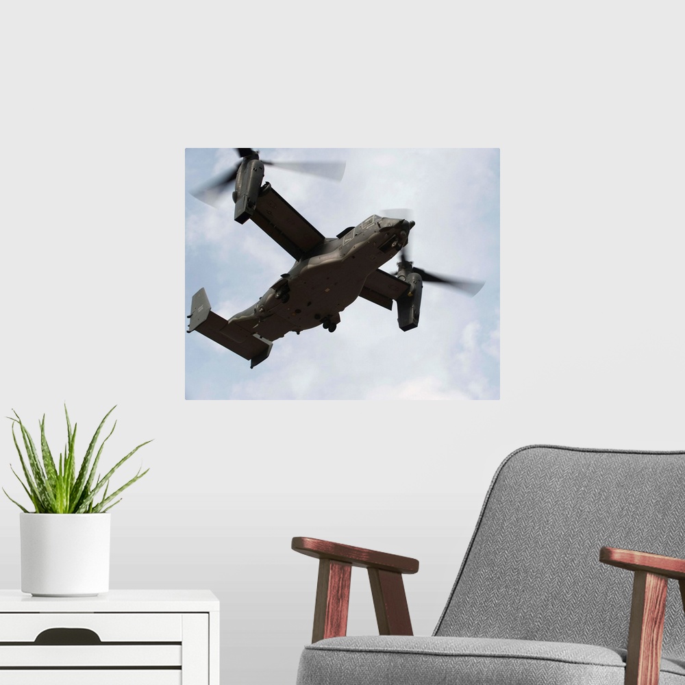 A modern room featuring February 1, 2011 - A U.S. Air Force CV-22 Osprey tiltrotor aircraft takes off during a local trai...