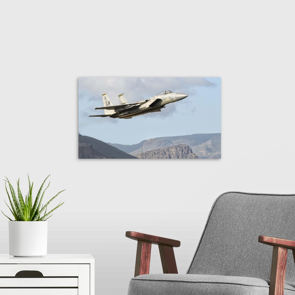 A modern room featuring A U.S. Air Force F-15C Eagle in flight over Spain during DACT Exercise 2010.  A NATO Dissimilar A...
