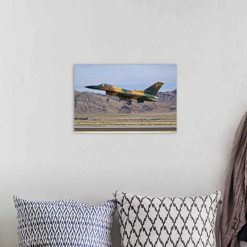A bohemian room featuring A U.S. Air Force F-16 of the 64th Agressor Squadron taking off from Nellis Air Force Base, Nevada.