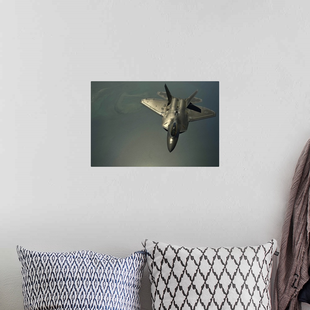 A bohemian room featuring April 25, 2014 - A U.S. Air Force F-22 Raptor flies after being in-air refueled over the U.S. Cen...