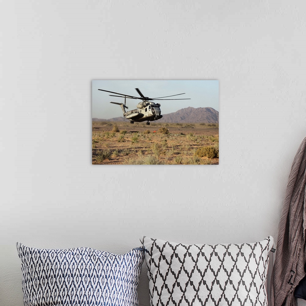 A bohemian room featuring May 5, 2010 - A U.S. Marine Corps CH-53 Sea Stallion helicopter lands to pick up Marines with Alp...