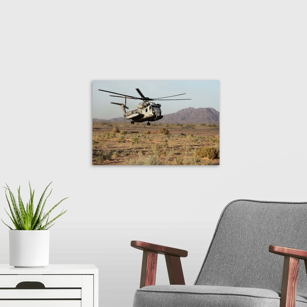 A modern room featuring May 5, 2010 - A U.S. Marine Corps CH-53 Sea Stallion helicopter lands to pick up Marines with Alp...