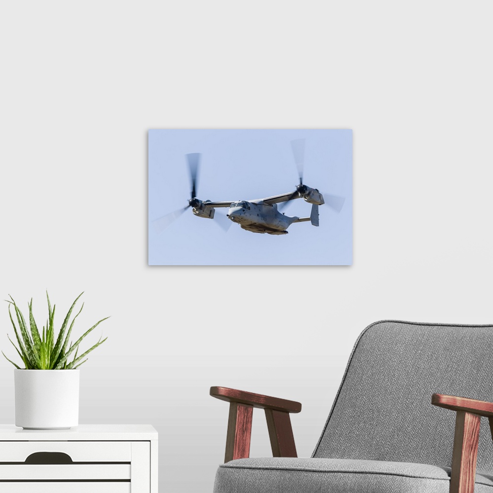 A modern room featuring A U.S. Marine Corps V-22 Osprey flies over Santa Rosa, California