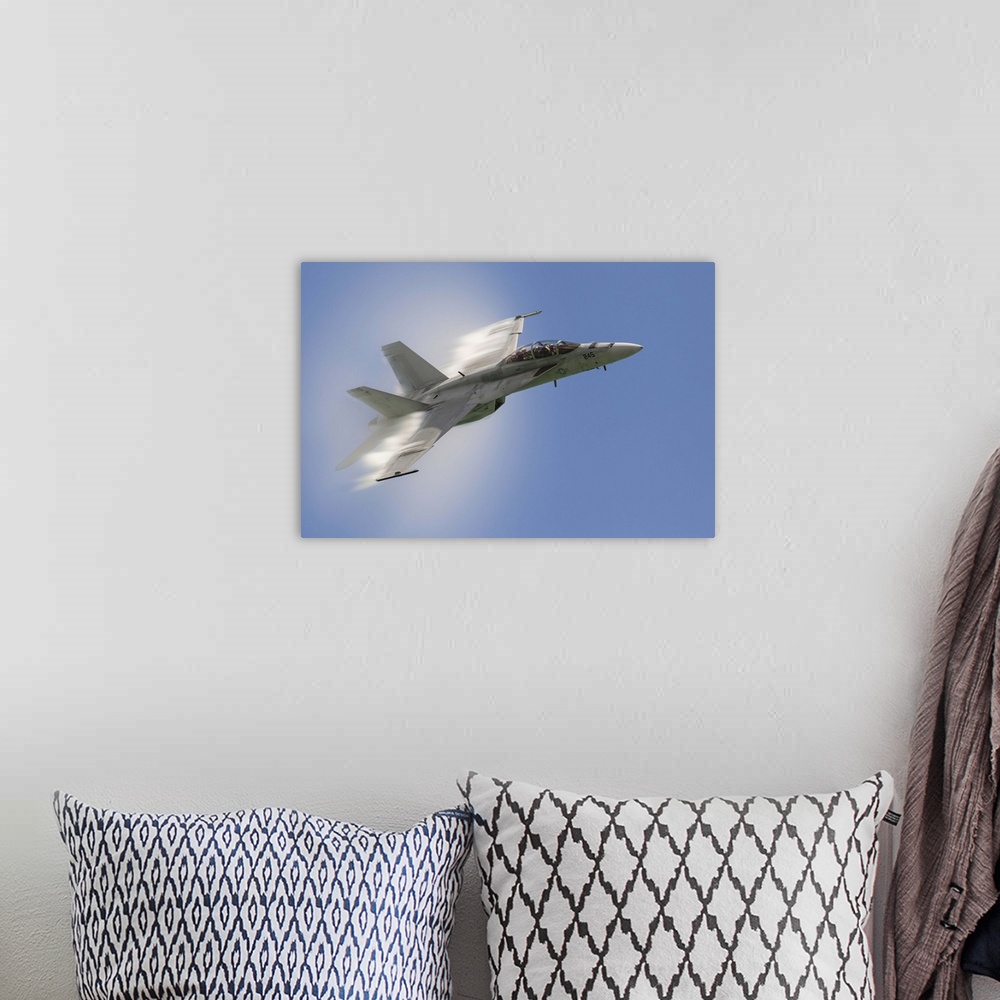 A bohemian room featuring A U.S. Navy F/A-18F performs a fast pass over Chicago, Illinois.