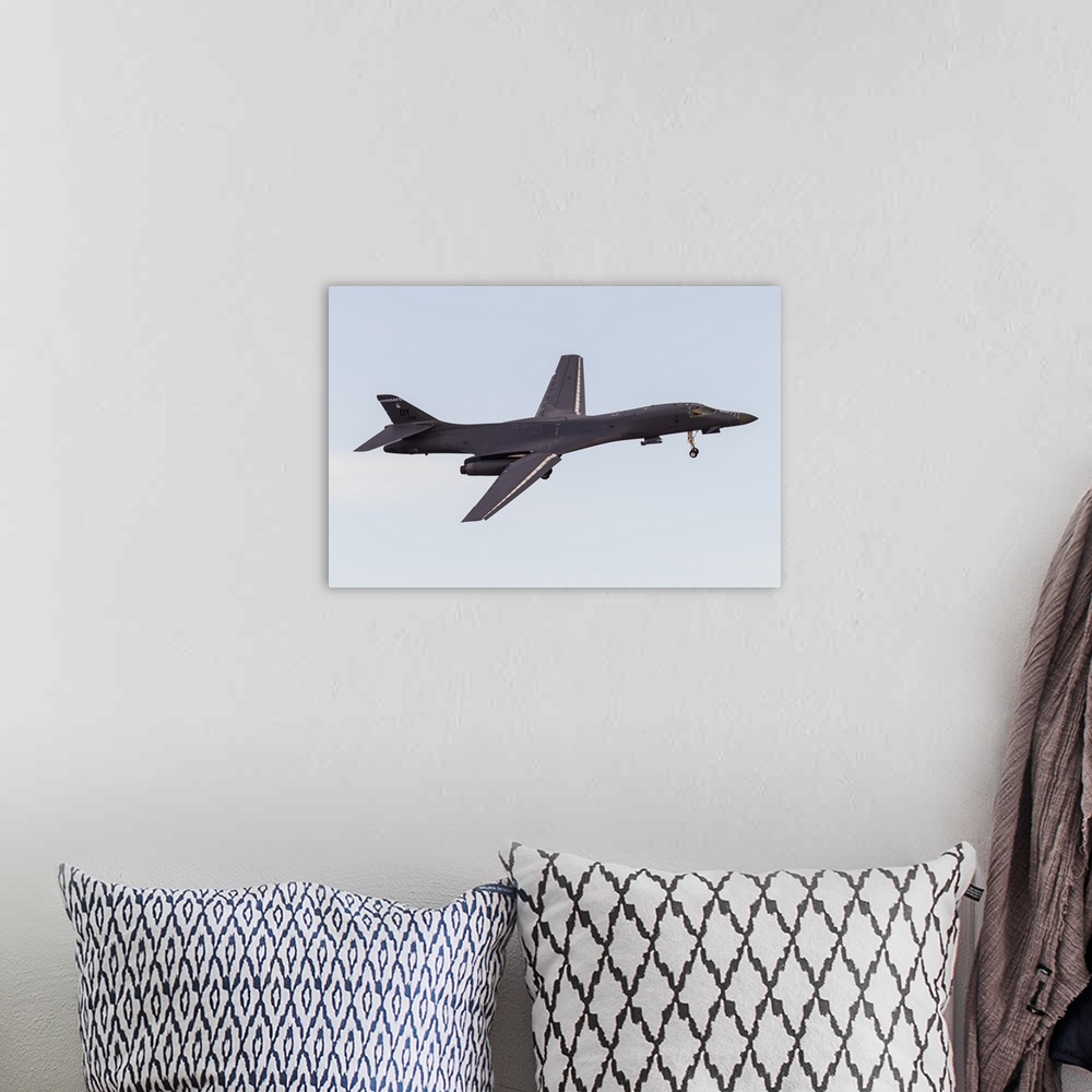 A bohemian room featuring A U.S. Air Force B-1B Lancer turns on to final approach at Nellis Air Force Base, Nevada.