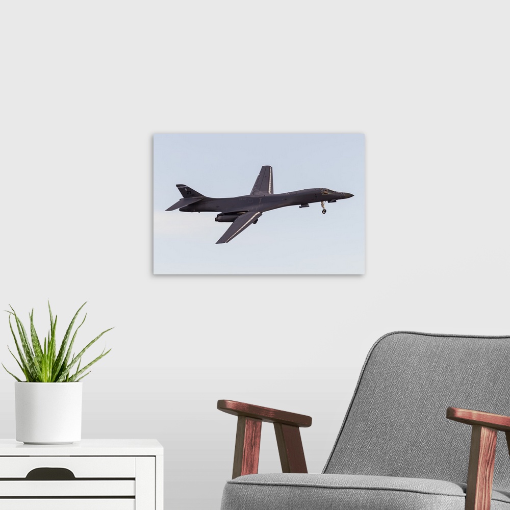 A modern room featuring A U.S. Air Force B-1B Lancer turns on to final approach at Nellis Air Force Base, Nevada.