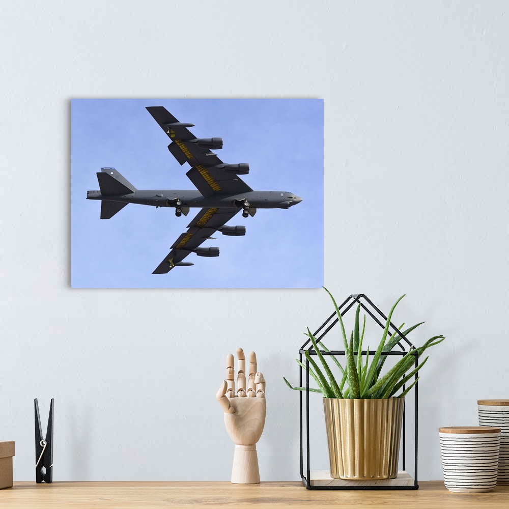 A bohemian room featuring A U.S. Air Force B-52G Stratofortress prepares for landing.