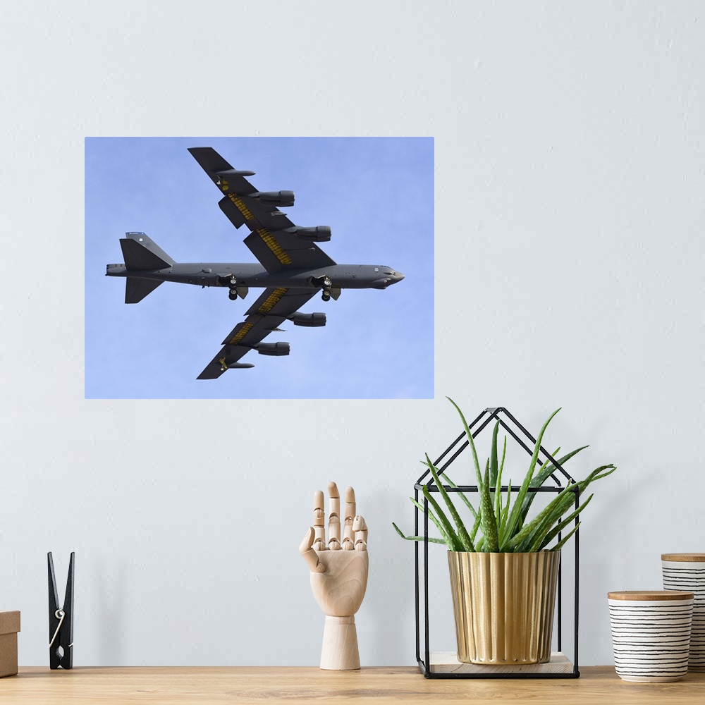 A bohemian room featuring A U.S. Air Force B-52G Stratofortress prepares for landing.