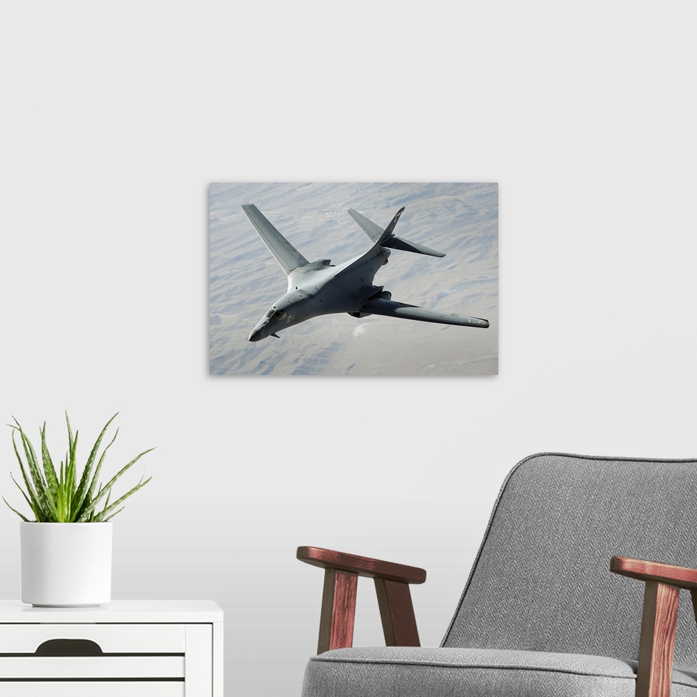 A modern room featuring A US Air Force B1B Lancer on a combat patrol over Afghanistan