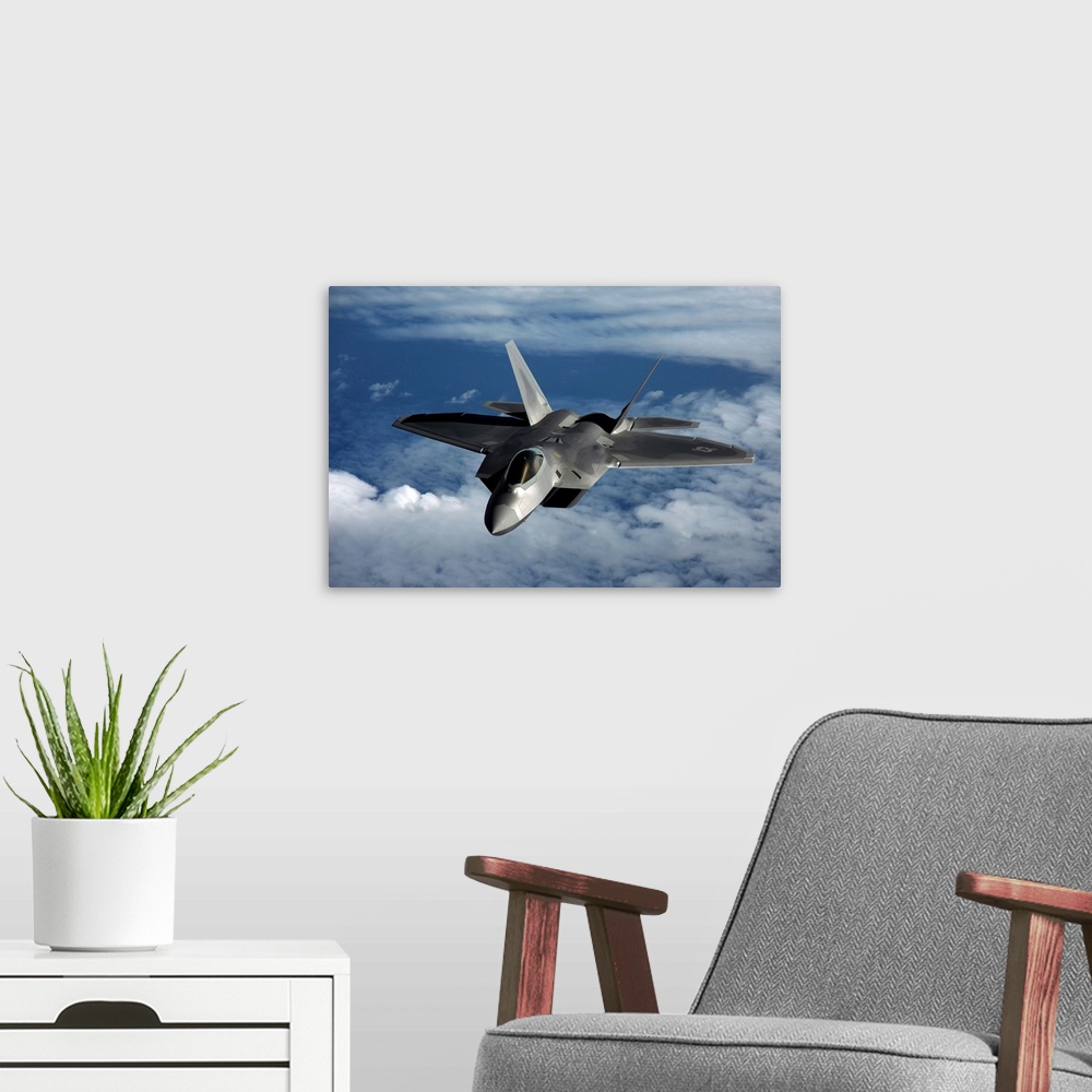 A modern room featuring A U.S. Air Force F-22 Raptor aircraft flies near Guam.