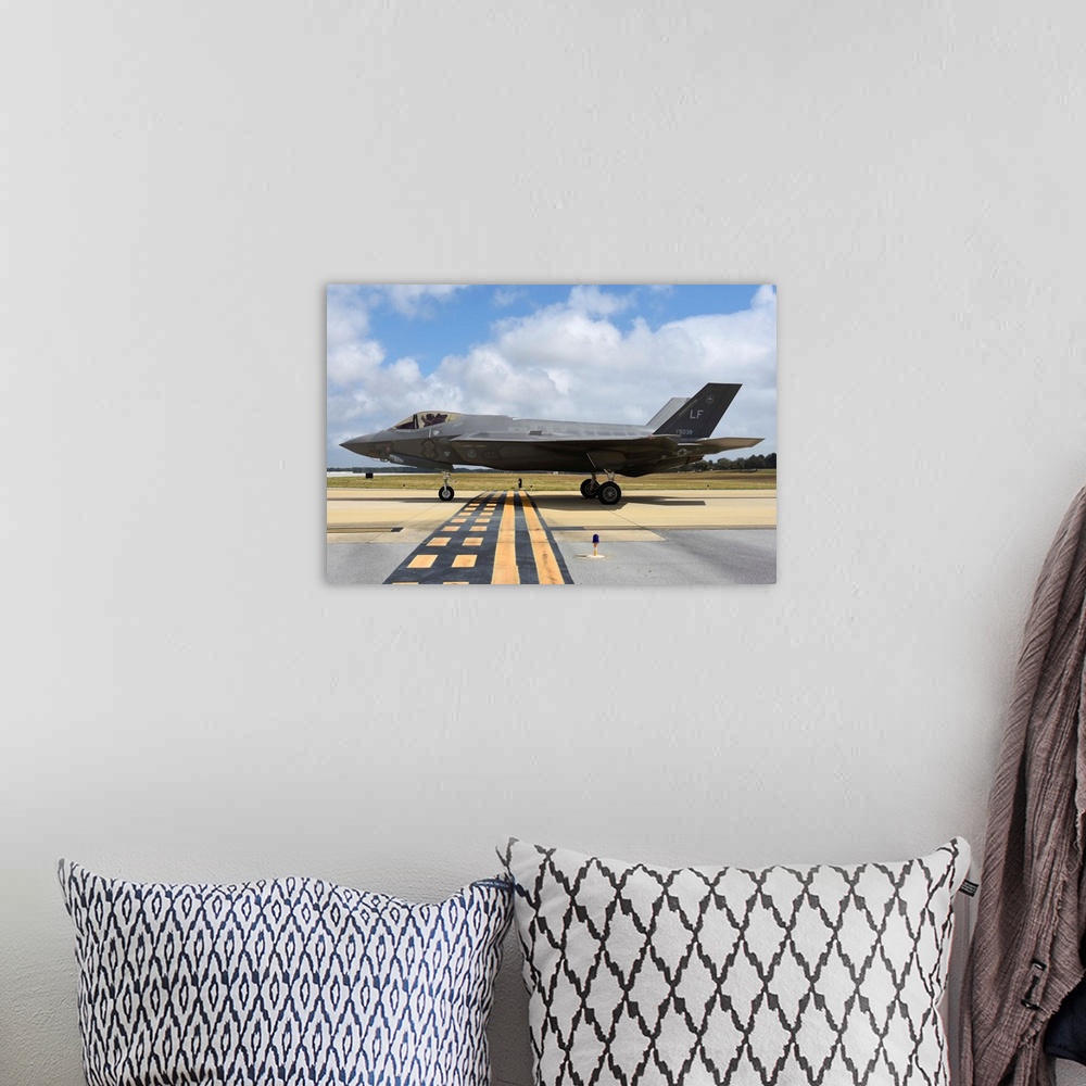 A bohemian room featuring A U.S. Air Force F-35A taxiing at Eglin Air Force Base, Florida.