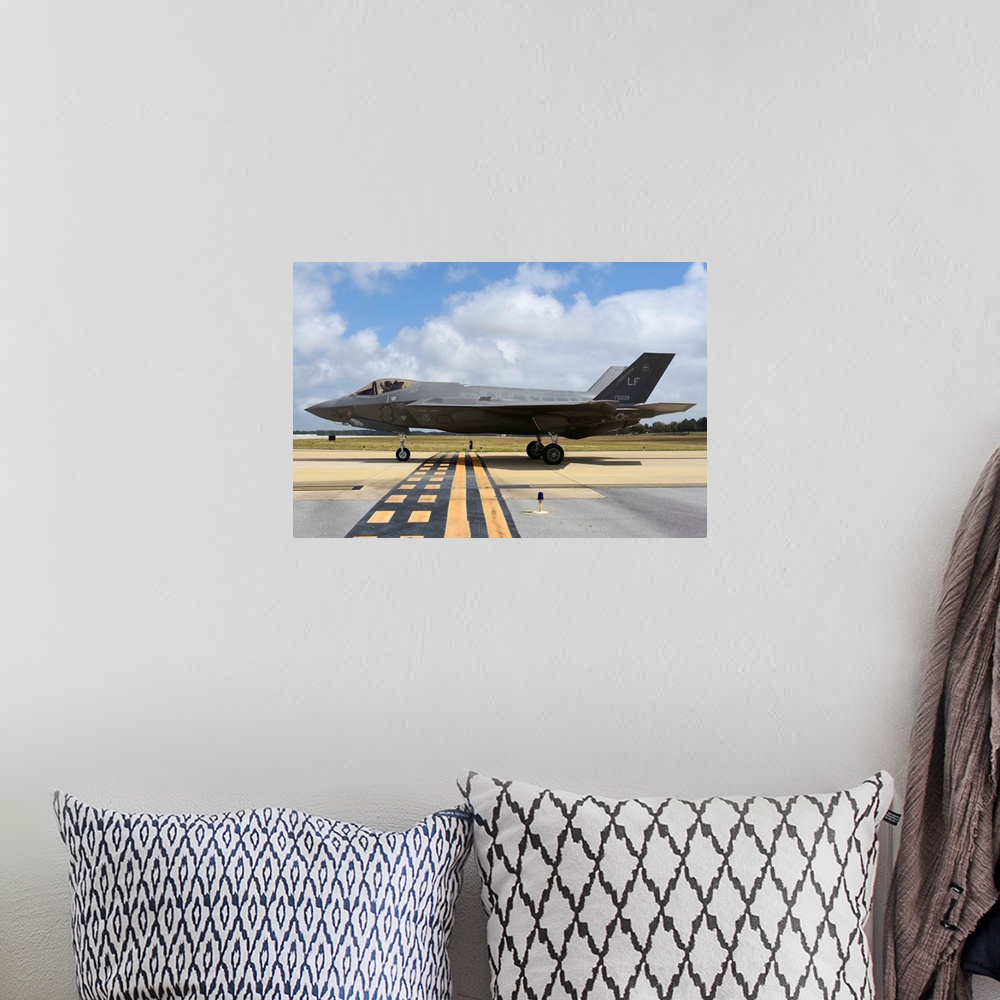A bohemian room featuring A U.S. Air Force F-35A taxiing at Eglin Air Force Base, Florida.