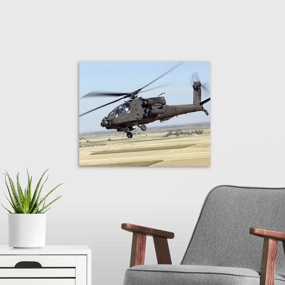 A modern room featuring A U.S. Army AH-64D Longbow Apache.