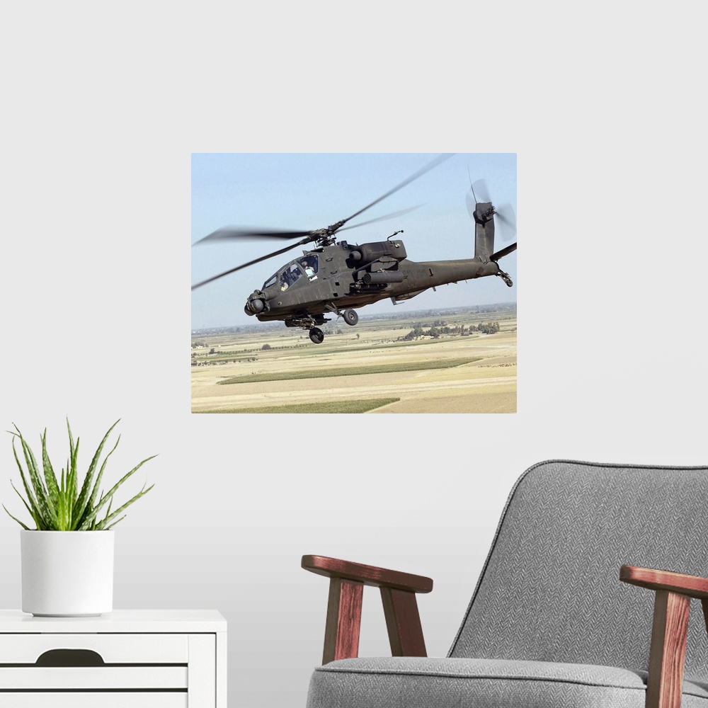 A modern room featuring A U.S. Army AH-64D Longbow Apache.