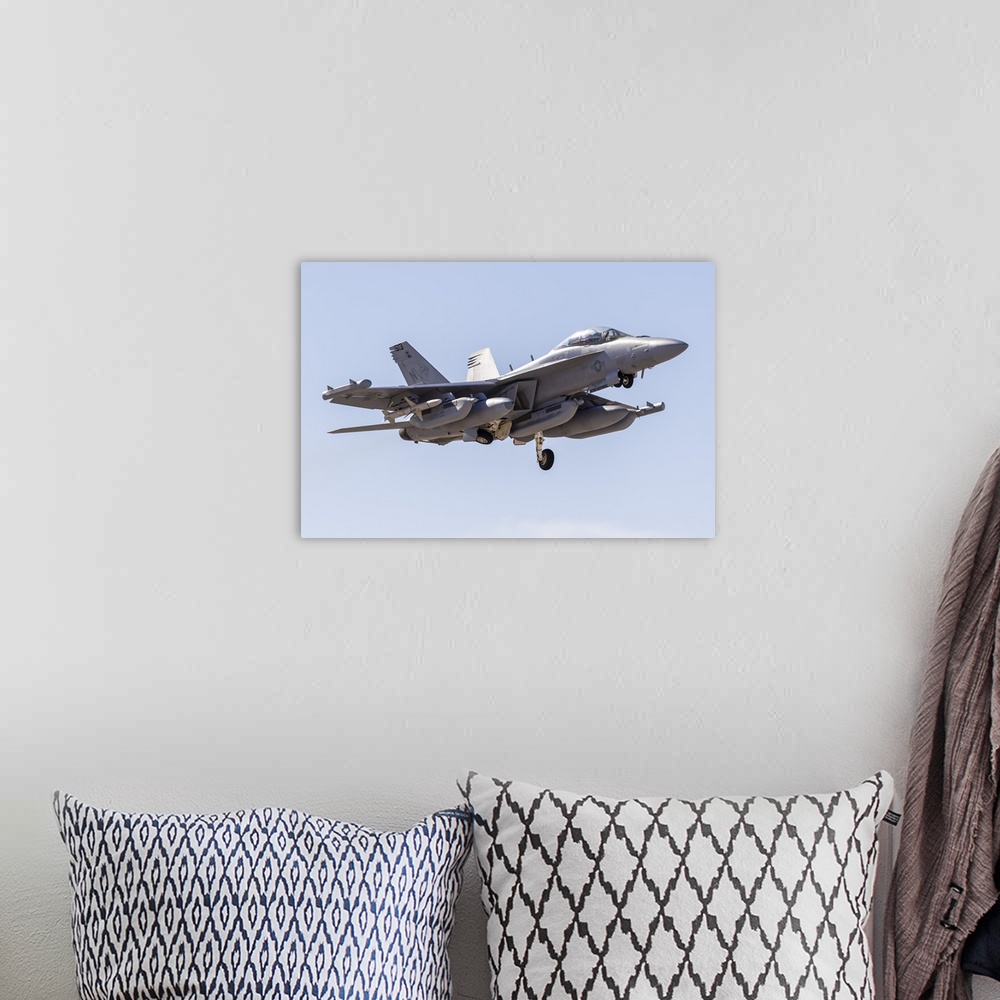 A bohemian room featuring A U.S. Navy E/A-18G Growler taking off from Nellis Air Force Base, Nevada.