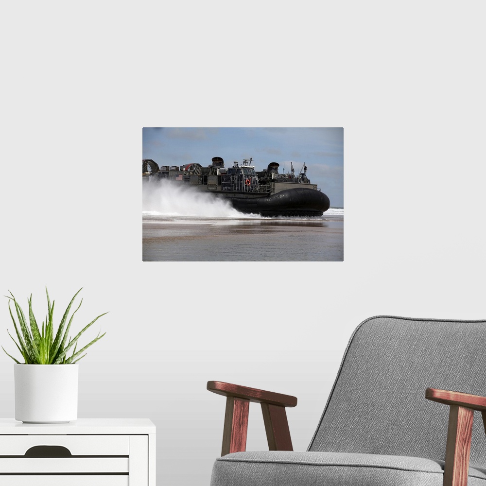 A modern room featuring April 9, 2012 - A U.S. Navy landing craft air cushion glides onto a Moroccan beach during Operati...