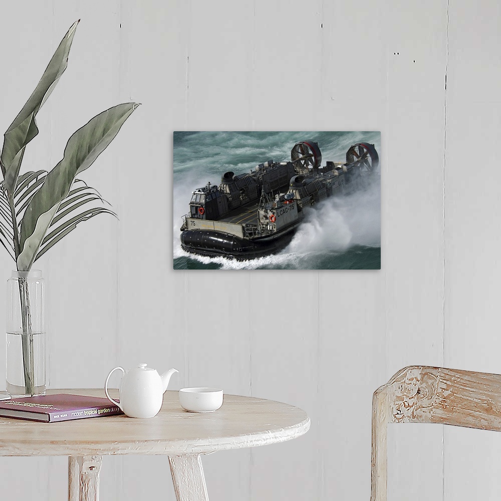 A farmhouse room featuring A US Navy Landing Craft Air Cushion heading to the Kuwait Naval Base
